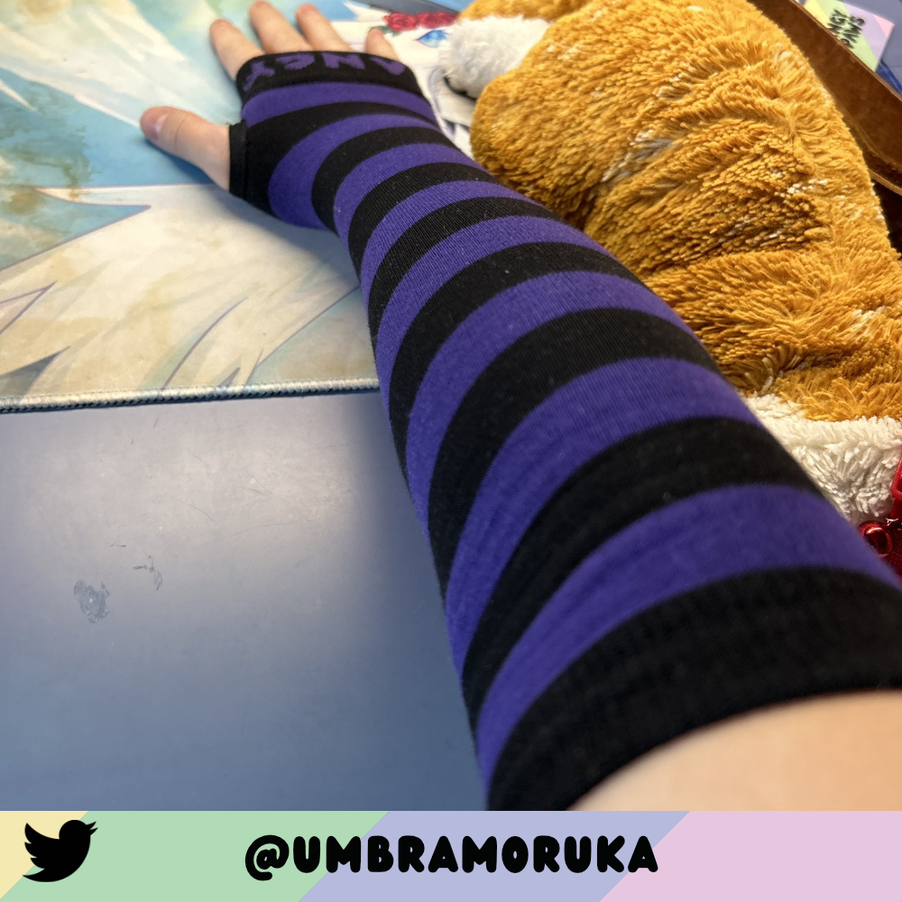 Purple vs Black Arm Warmers